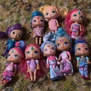 9 Teenie Genie Dolls